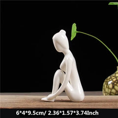 White Ceramic Yoga Figurines