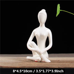 White Ceramic Yoga Figurines