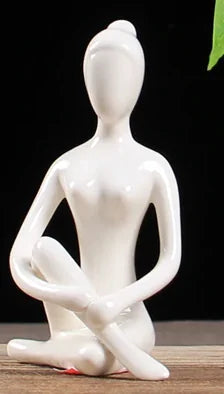 White Ceramic Yoga Figurines