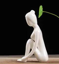 White Ceramic Yoga Figurines