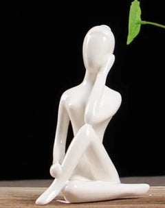 White Ceramic Yoga Figurines